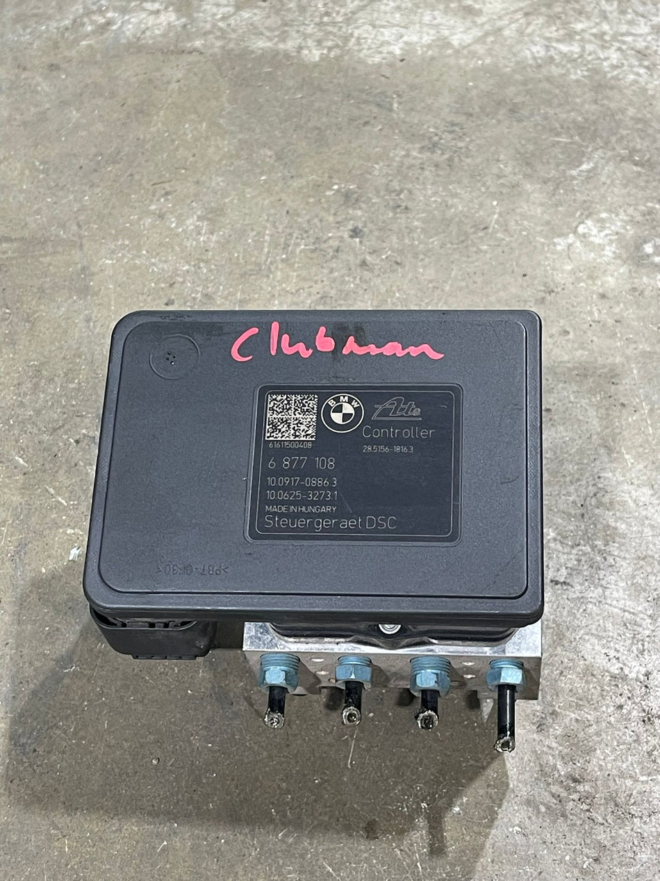 BMW / MINI Cooper Group DSC (Dynamic Stability Control) hydraulic pump modulator and electronic ECU controller assembly