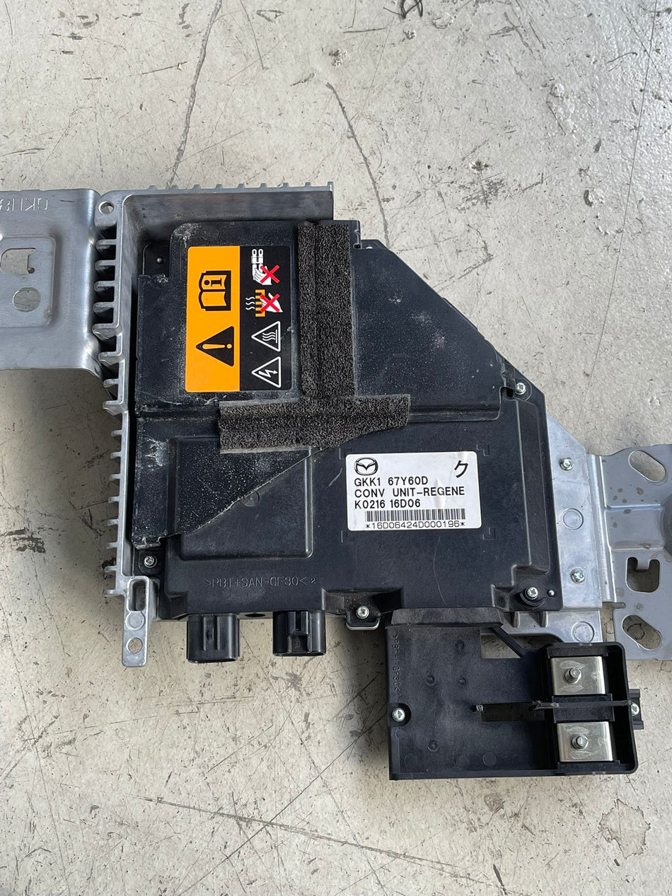 Mazda i-ELOOP energy regeneration DC-DC converter unit.