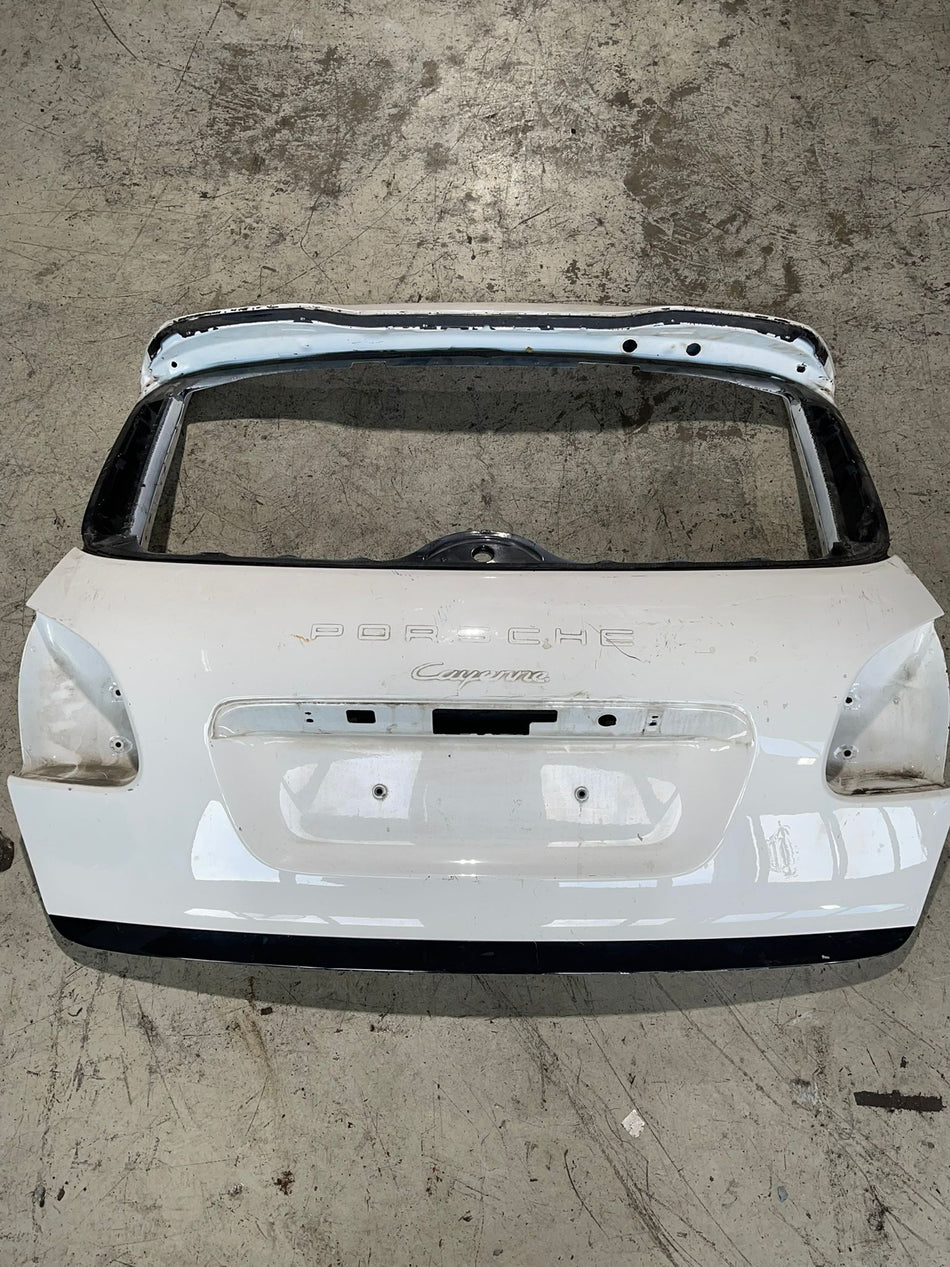 Porsche Cayenne luxury mid-size SUV rear liftgate panel assembly.