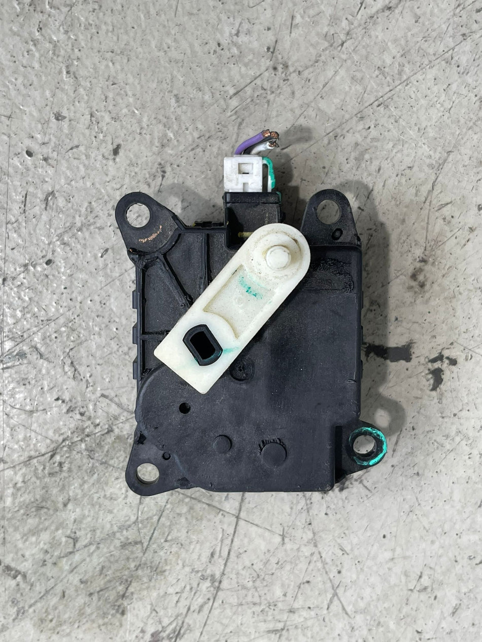 Genuine Nissan factory interior HVAC climate control blend door flap actuator damper servo motor assembly